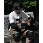 RKD495 REKD Pro Wrist Guards Black Putting On 1.jpg